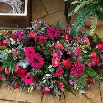 Reds &amp; Greens Casket Spray
